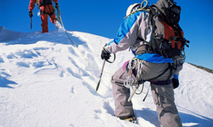 Mountain climbers in snow