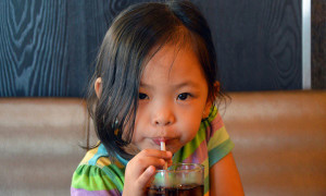 Girl drinking soda